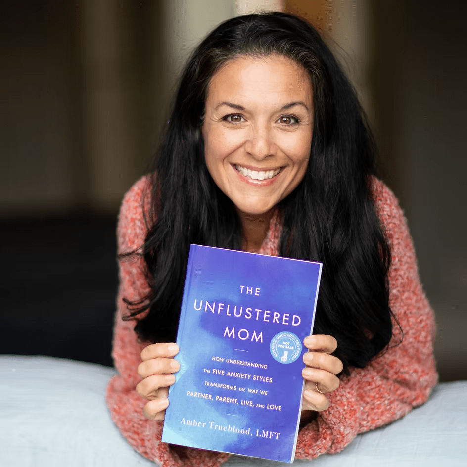 Amber Trueblood with The Unflustered Mom Book